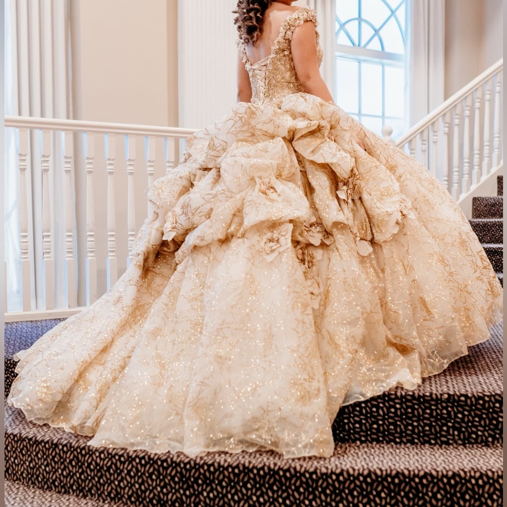Beautiful gold and white Quince dress from Peaches Boutique in Chicago.